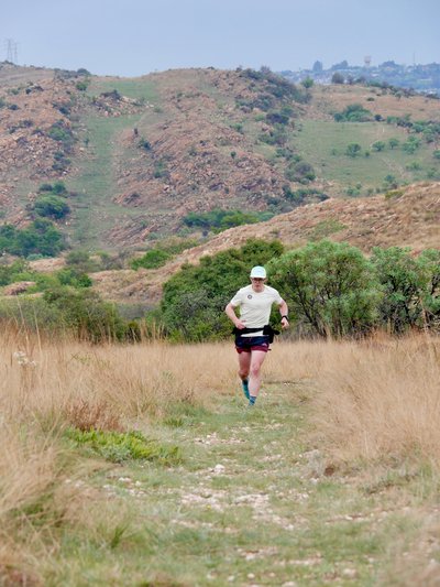 Trail runner at Melville Koppies Nature Reserve.